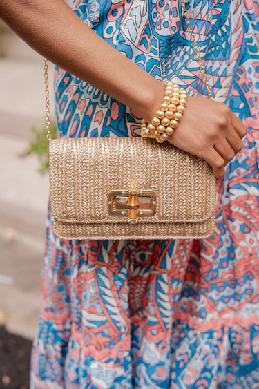 Lilly - Gold Woven Straw Clutch - Bamboo Toggle - Lisi Lerch